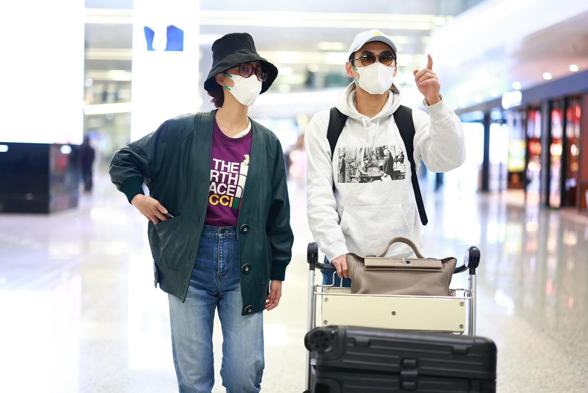 袁弘夫婦現身機場熱聊不停感情好，張歆藝瘦回女神範天鵝頸搶鏡